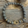 Chakra Bracelet - Antique Gold Hamsa & Lava Stone